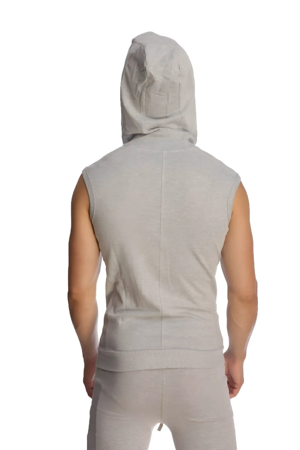 A light gray heather sleeveless yoga hoodie with hood and front seam worn by a person