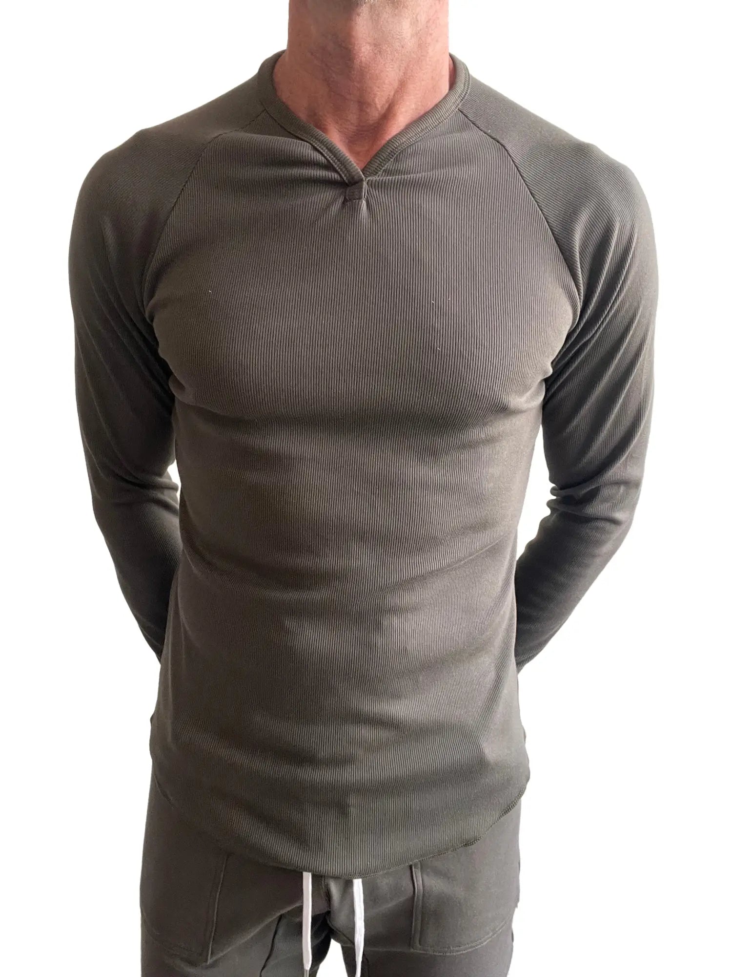 A sleek olive green thermal v neck long sleeve shirt with ribbed fabric and fitted design for layering or casual wear