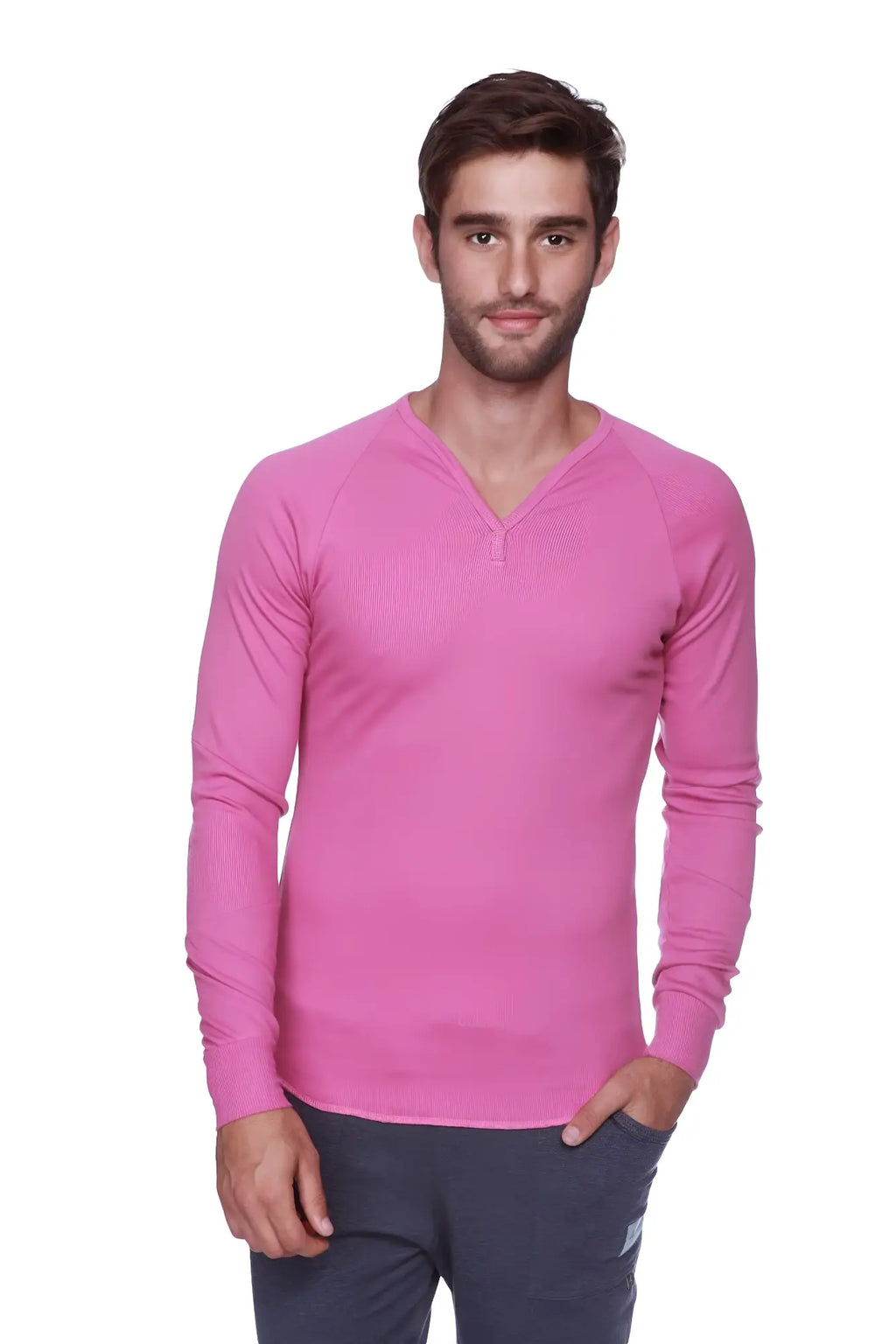 A vibrant pink thermal v neck long sleeve sweater with subtle ribbed texture and raglan sleeves