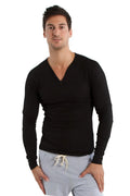 Black thermal v-neck long sleeve shirt with fitted silhouette and subtle ribbed texture for layering or warmth