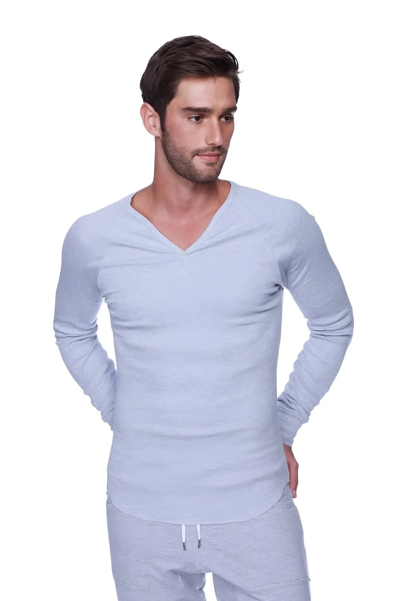 Thermal v-neck long sleeve shirt in heather grey with a subtle texture made from warm breathable fabric