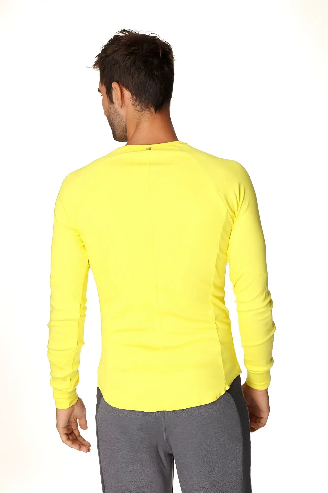 Thermal v-neck long sleeve athletic shirt in tropic yellow with fitted cut and ribbed cuffs for warmth and comfort