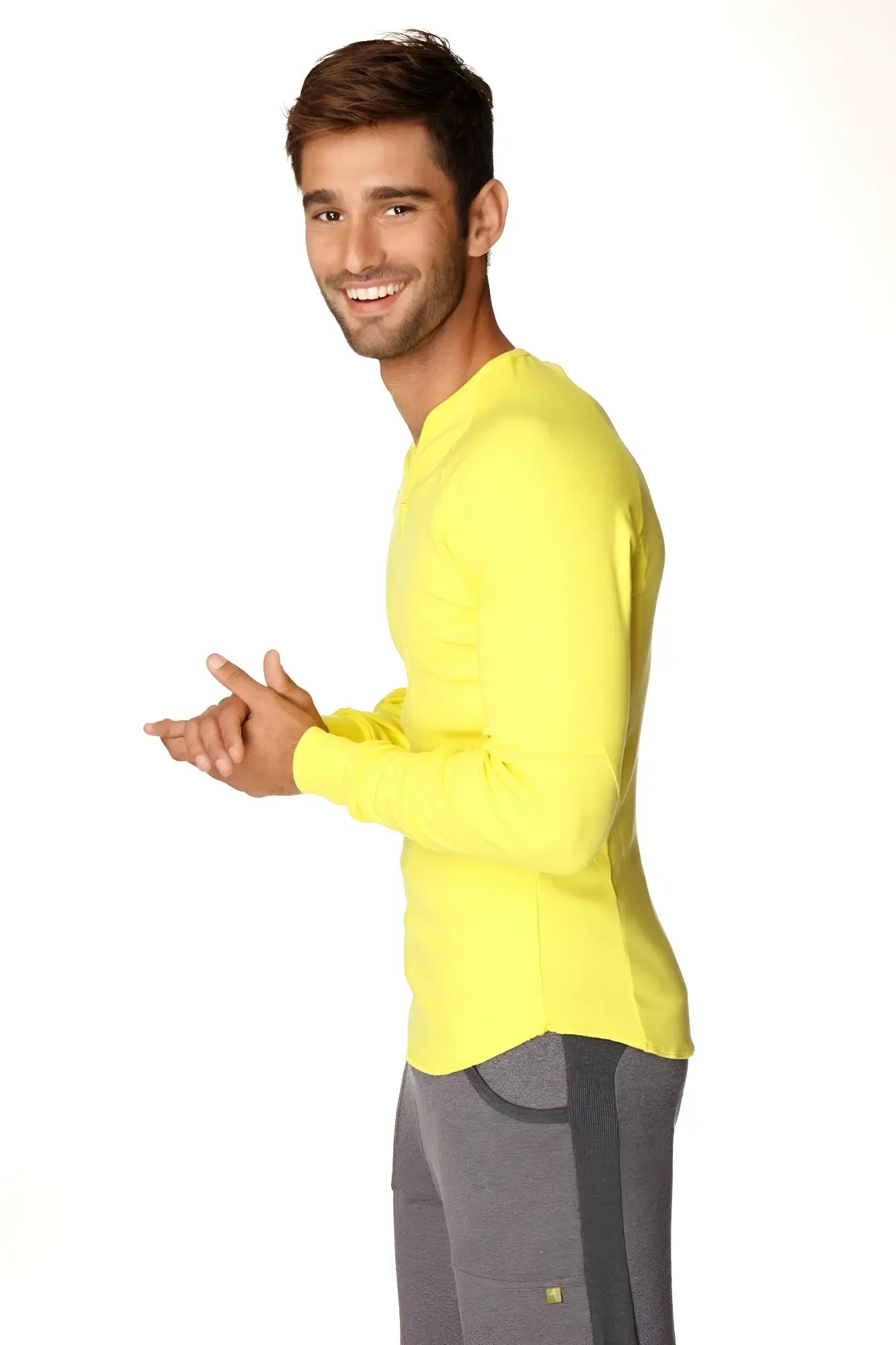 Bright yellow thermal long sleeve crew neck top designed for warmth and comfort in tropic yellow color