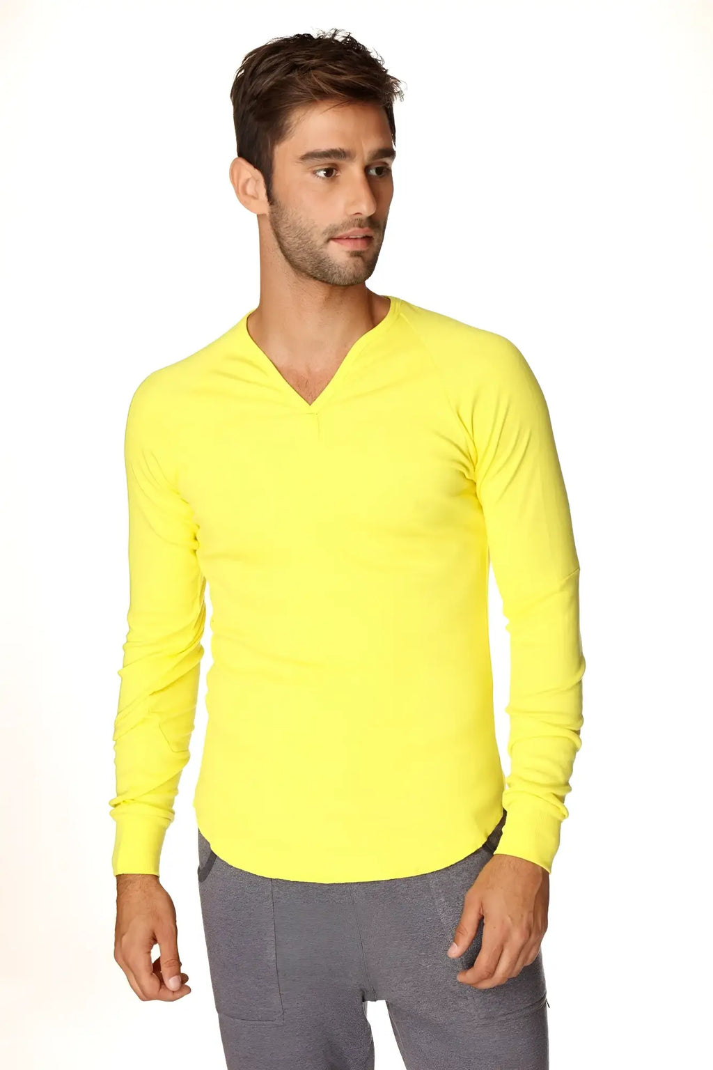 Bright yellow thermal v-neck long sleeve shirt featuring a warm and comfortable design in tropic yellow color