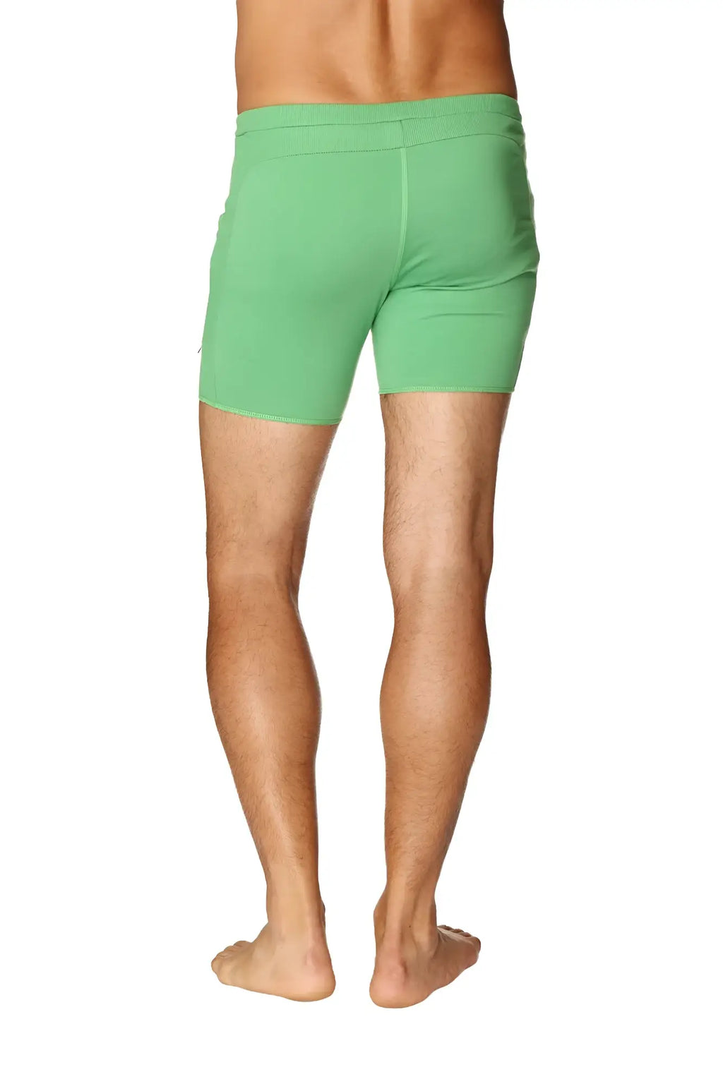 Green transition yoga shorts with snug fit elastic waistband made from bamboo fabric for athletic use