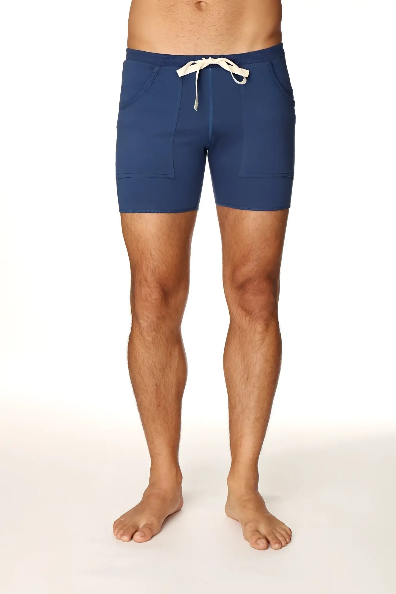 Transition yoga short in navy blue with white drawstring and front pockets designed for athletic use