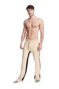 Beige tri-color stretch eco-track and yoga sweat pants with black side stripes and a drawstring waistband