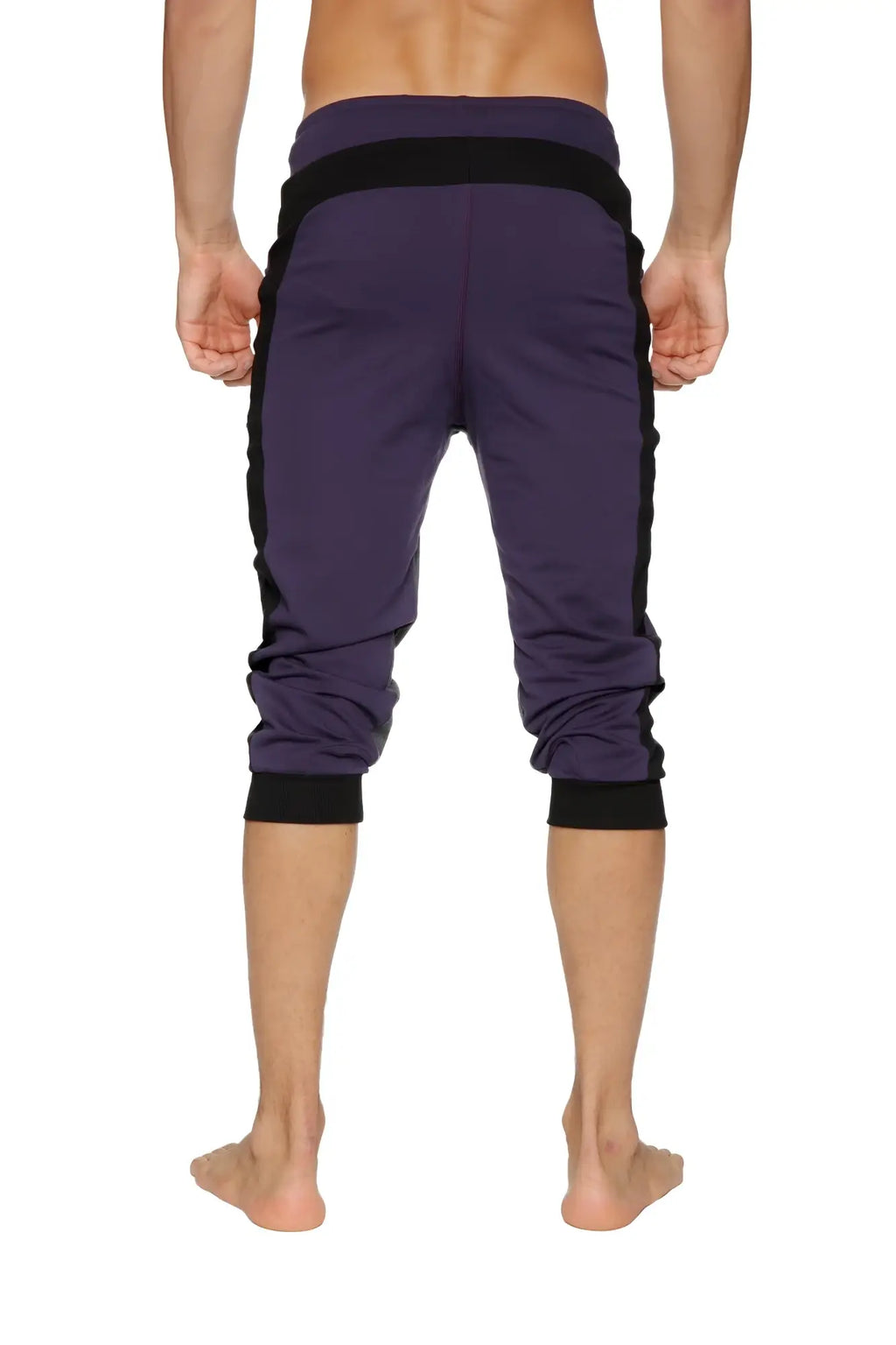 Ultra-flex tri-color cuffed yoga pant in eggplant with black side panels and elastic cuffs for athletic wear