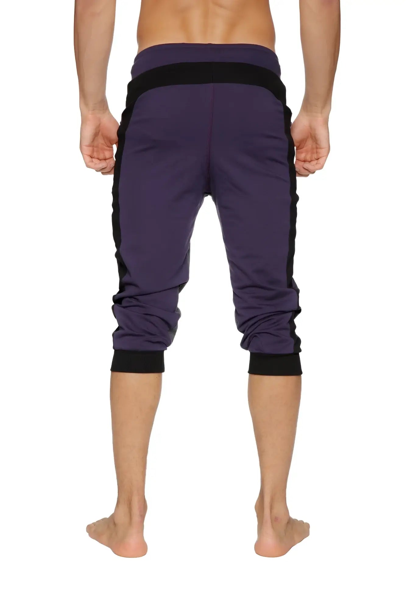 Ultra-flex tri-color cuffed yoga pant in eggplant with black side panels and elastic cuffs for athletic wear