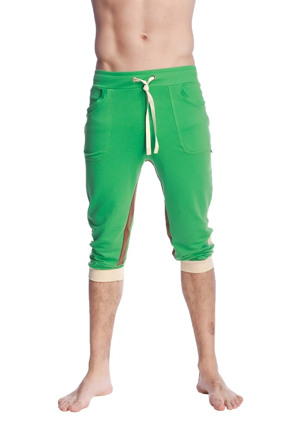 Green ultra-flex tri-color cuffed yoga pant featuring capri-length joggers with beige drawstring and matching cuffs