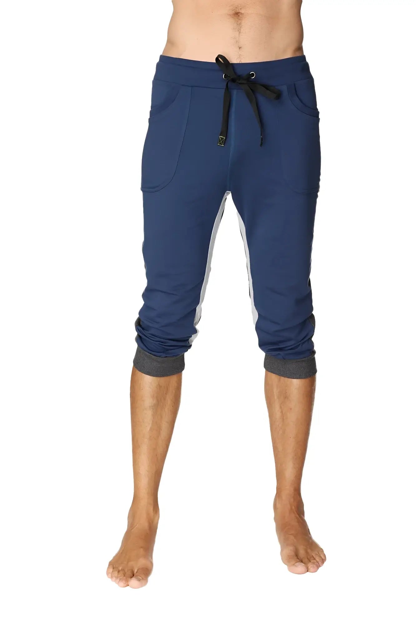Ultra-flex tri-color cuffed yoga pant in navy blue with white side panels and black drawstring waistband, capri length