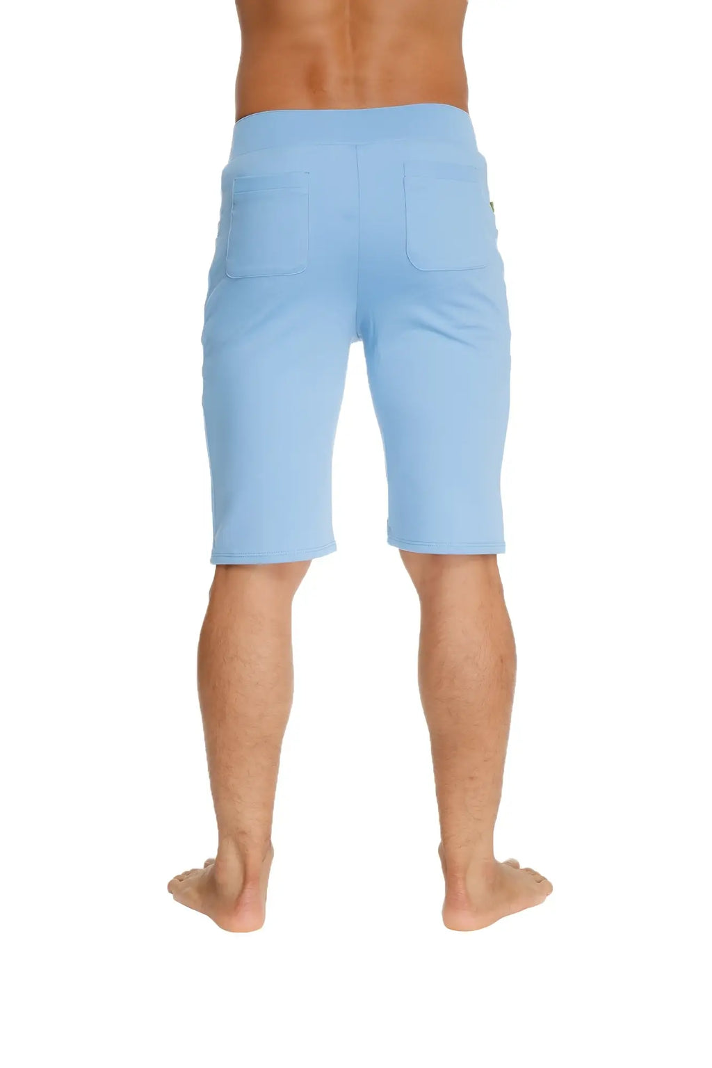 Light blue urban tactical at home dress shorts in soft fabric with relaxed fit and two back pockets shown from the back