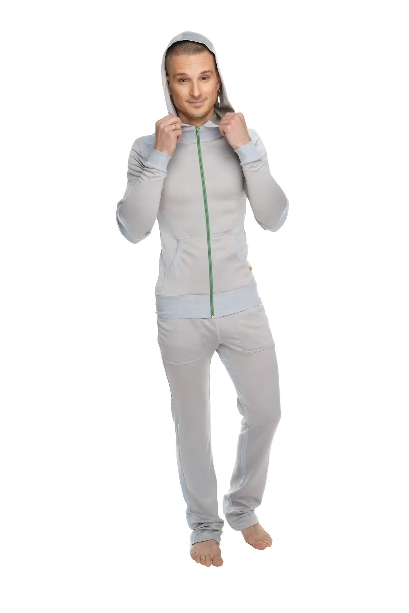 A light gray mid-weight fleece form-fit yoga track hoodie with green zipper and matching hood from the winter collection