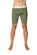 Olive green yoga compression shorts with white waistband and colorful abstract patterns perfect for athletic use