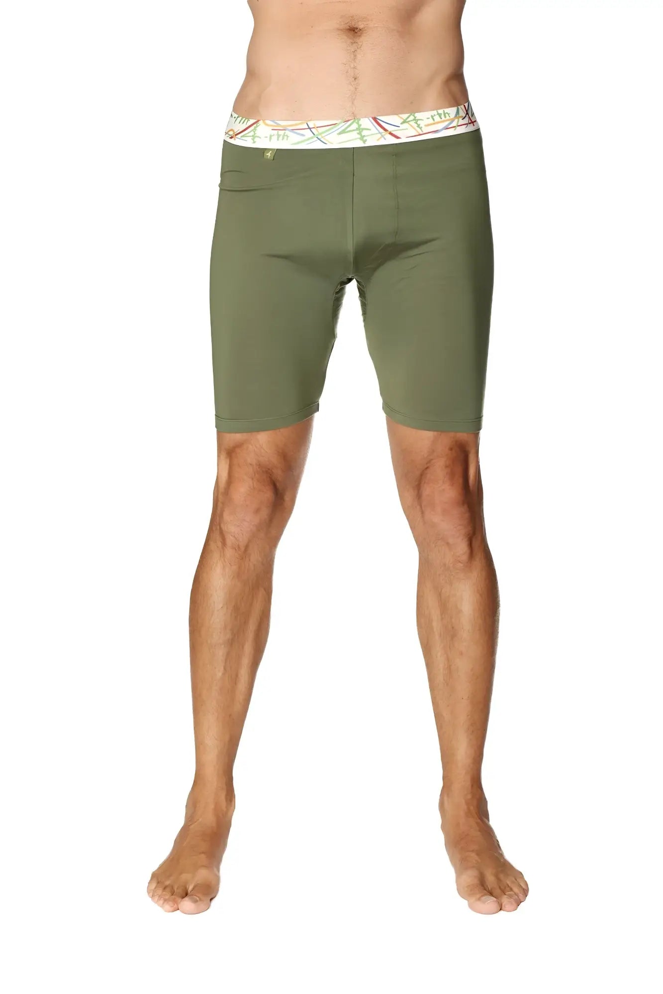 Olive green yoga compression shorts with white waistband and colorful abstract patterns perfect for athletic use