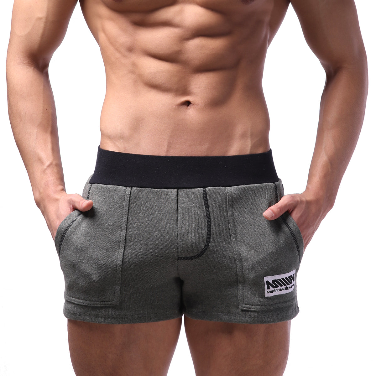 Gray MetroMaleWear Boston athletic shorts with black elastic waistband and white logo patch on lower right leg in khaki