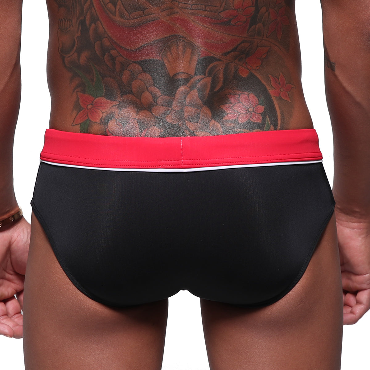 MetroMaleWear Bing Sport black swim brief with vibrant red waistband and thin white trim for active swim use