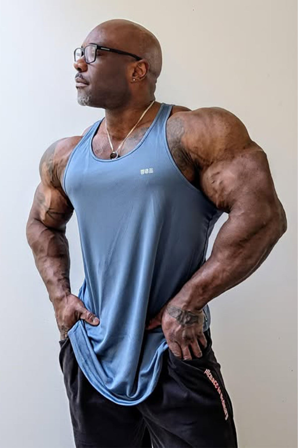 Jed North Fast-Dry Bodybuilding Workout Stringer – Grau USA Logo
