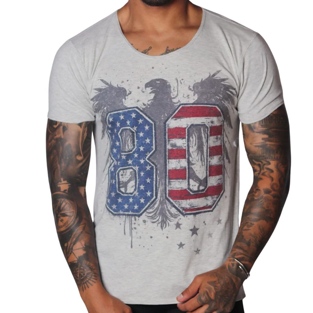 Light grey, scoop-neck t-shirt featuring a distressed eagle graphic with a US flag-themed "80" print.