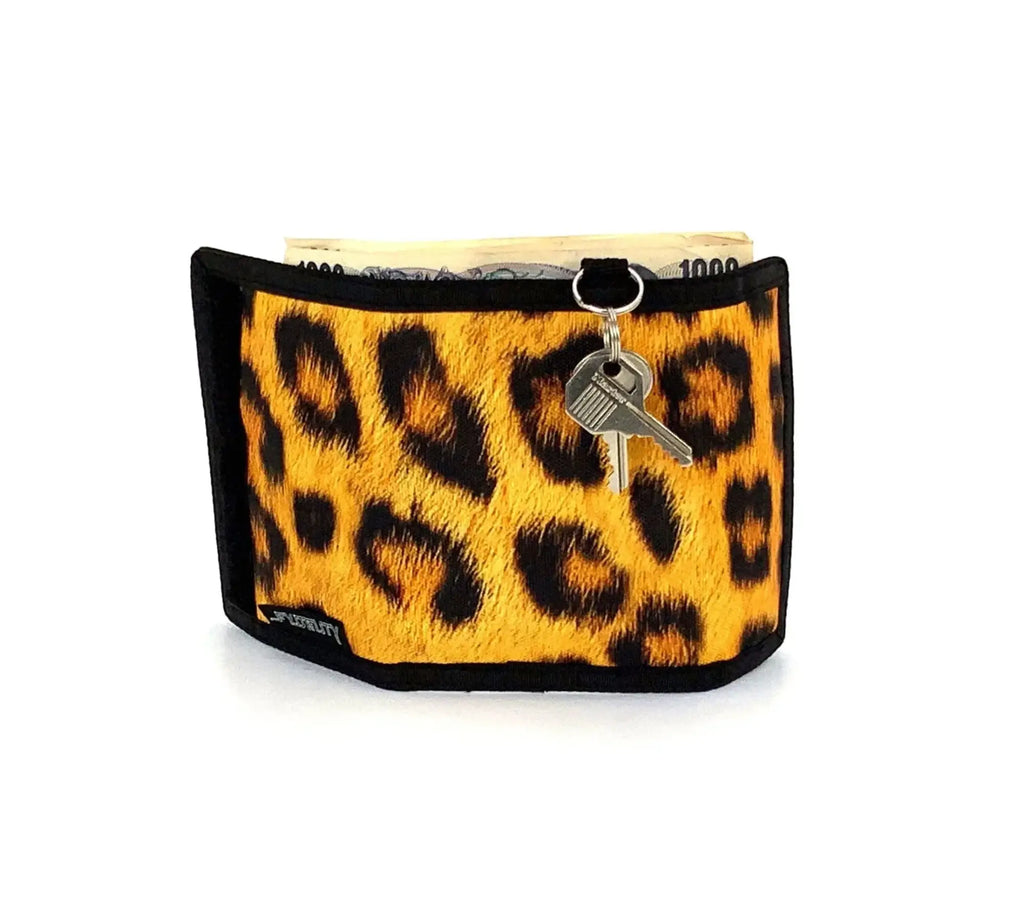 A vibrant yellow and black leopard print 80s velcro wallet with a sleek black border and front keychain attached