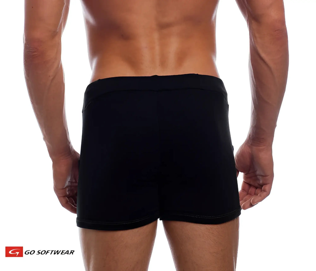 Black 9 inch sport shorts with elastic waistband and pockets featuring a snug fit for athletic use