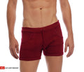 9 inch maroon sport shorts with drawstring waistband and two front pockets made from soft fabric for athletic use