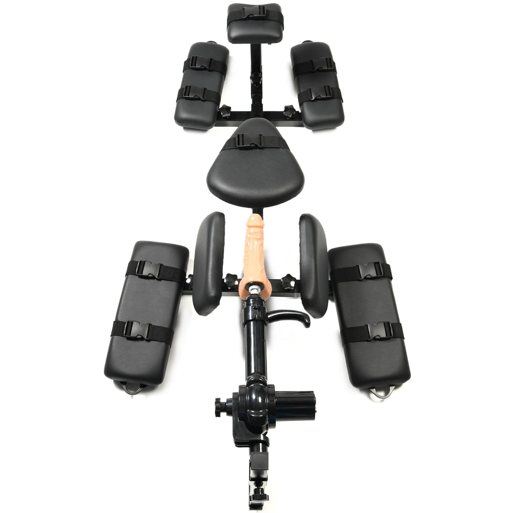 Master Series Subversion Deluxe Stockade with integrated sex machine, featuring black padded restraints on a metal frame.