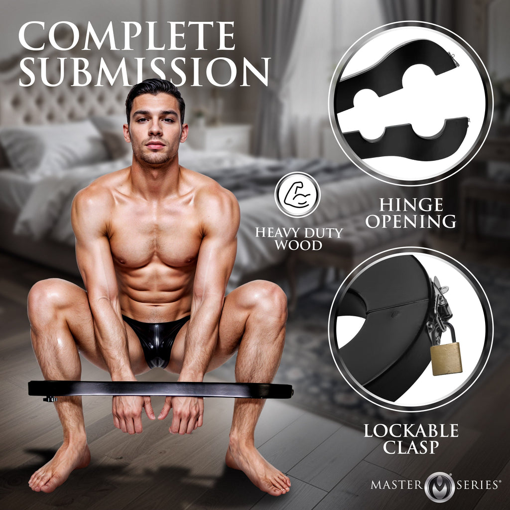 Master Series black wooden wrist and ankle stocks shown with a man in a bedroom, featuring hinge and locking details.