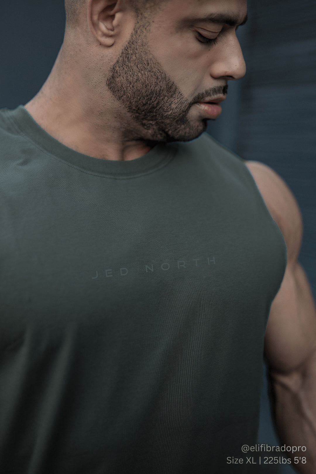 Apollo men’s sleeveless training tee in moss green with subtle jed north branding across the chest for athletic use