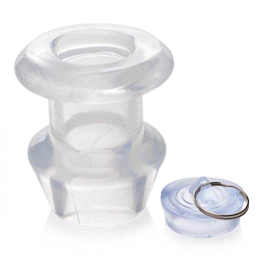 Dilatador anal hueco transparente con tapón para el culo