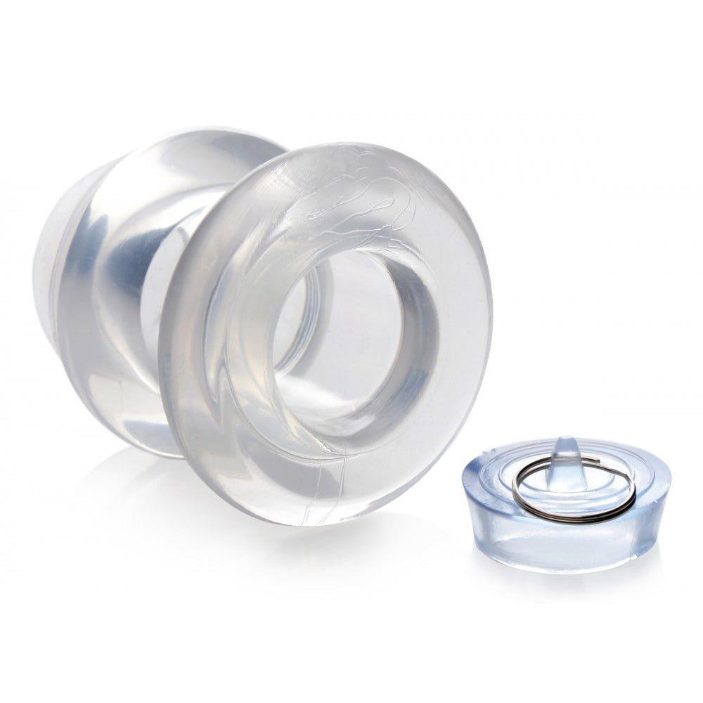 Dilatador anal hueco transparente con tapón para el culo