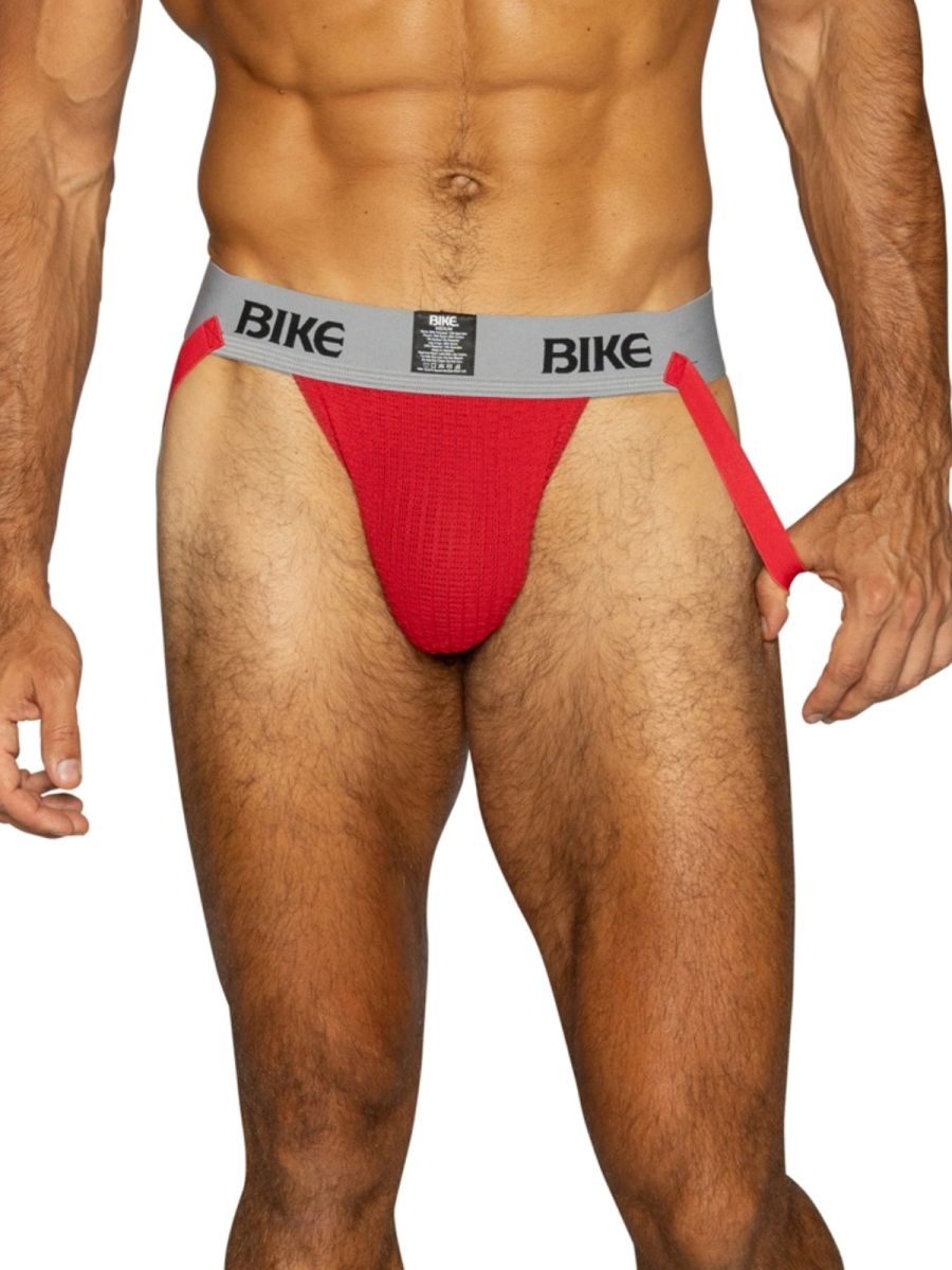 Red BIKE athletic jockstrap with gray waistband and red straps.