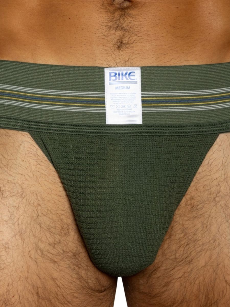 Olive green BIKE jockstrap with a ribbed pouch and striped waistband, size medium.