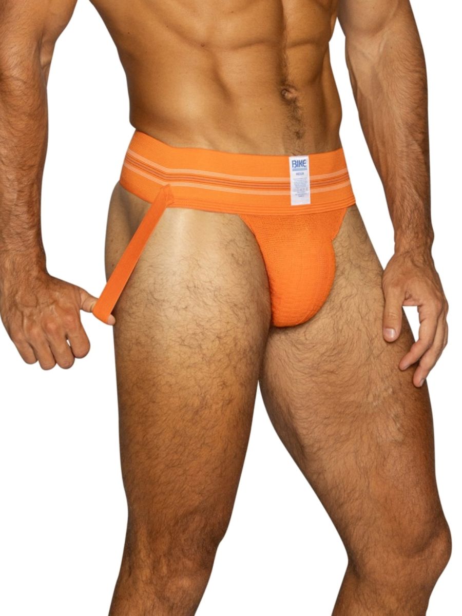 Orange BIKE athletic jockstrap with a wide waistband and leg straps.