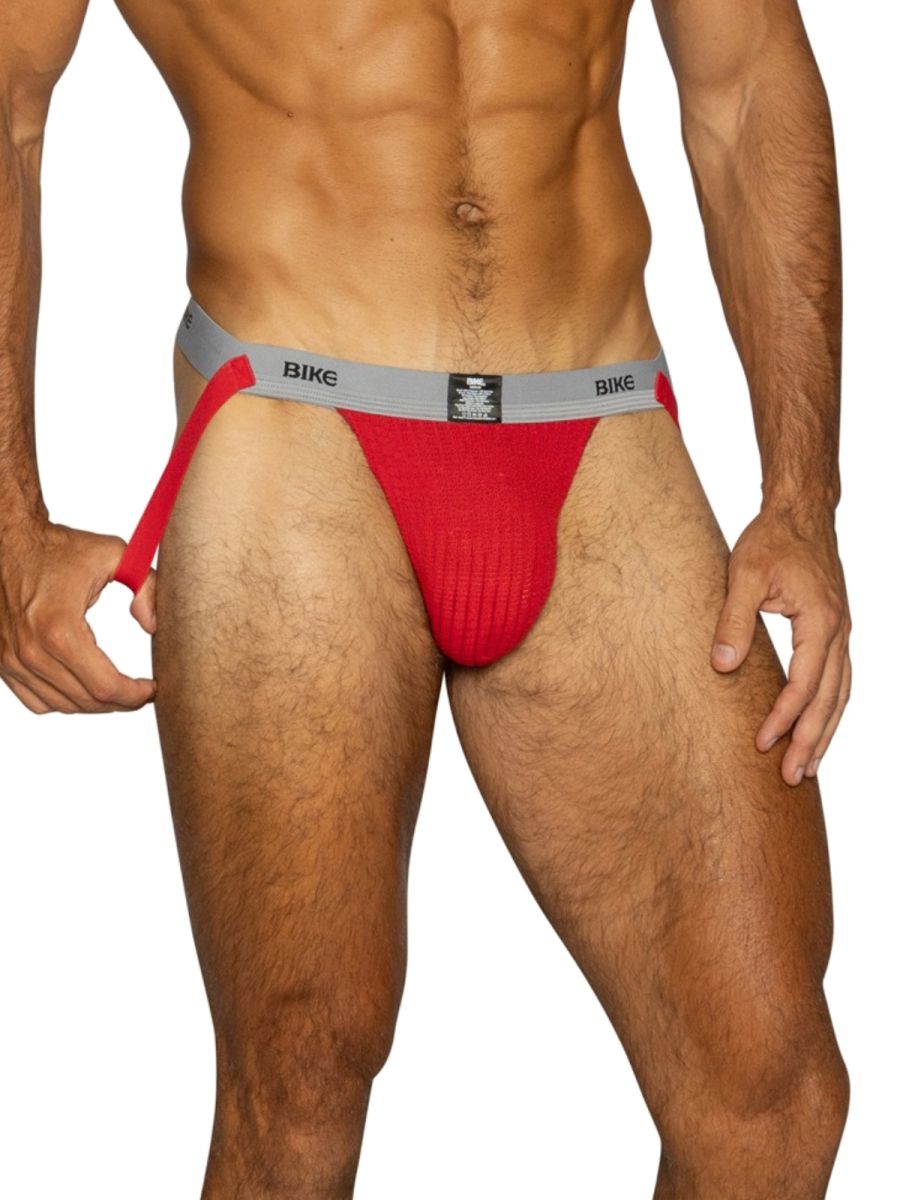 Red BIKE athletic jockstrap with gray waistband and leg straps.