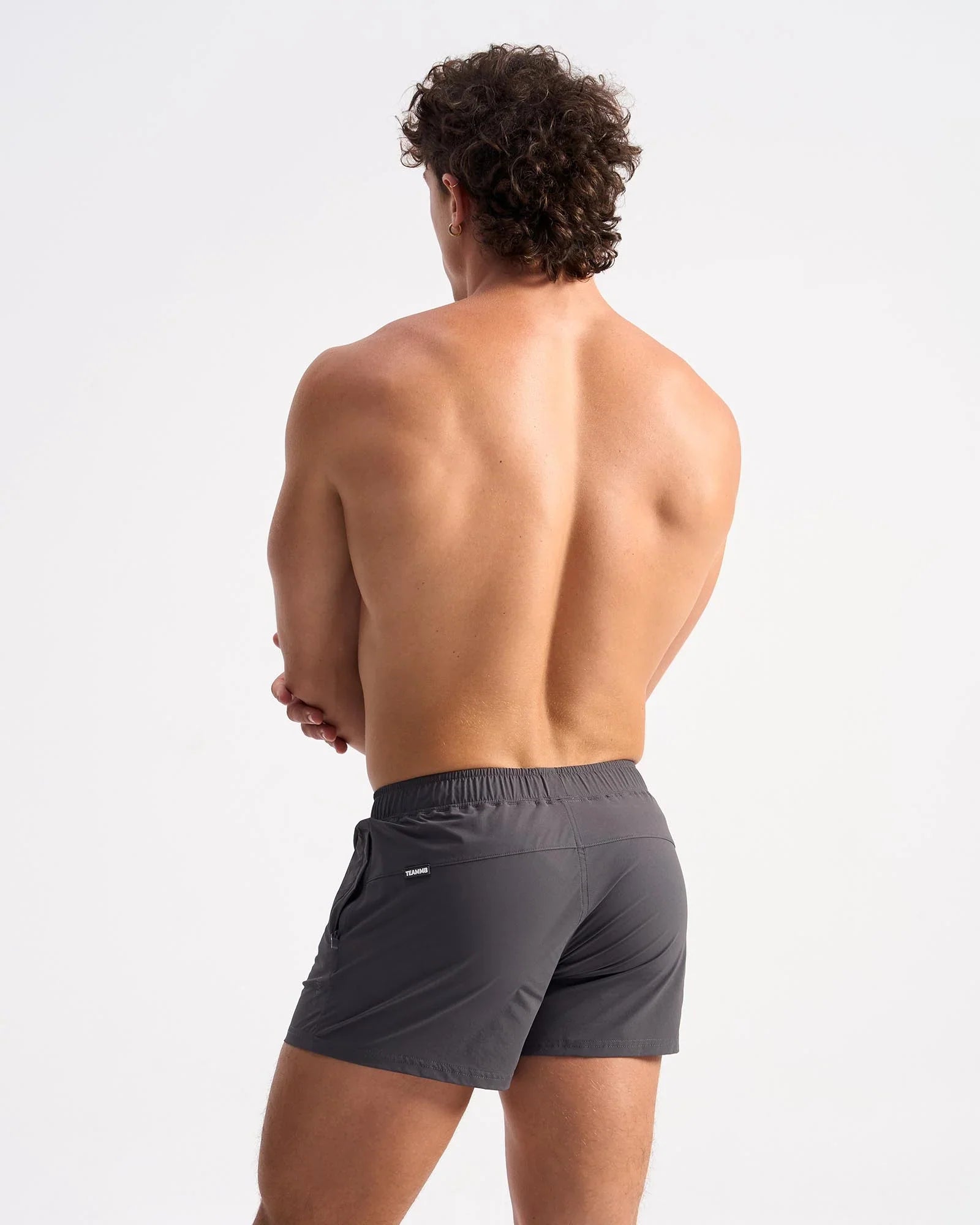 Dark gray bolt 3 inch athletic shorts with sleek modern design and elastic waistband for active use