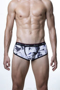 Black and white splatter-patterned men’s briefs with red-trimmed sroovin waistband groovin underwear cbp1802