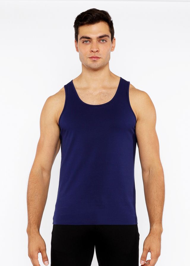 Navy blue sleeveless circle spine laser cut stretch jersey tank top showcasing its breathable fabric