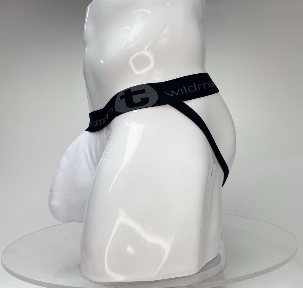 WildmanT Big Boy white jockstrap with a large pouch and black branded elastic waistband on a white mannequin.