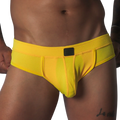 Bright yellow, textured mesh brief with a supportive pouch, tonal piping, and a small black rectangular logo patch.