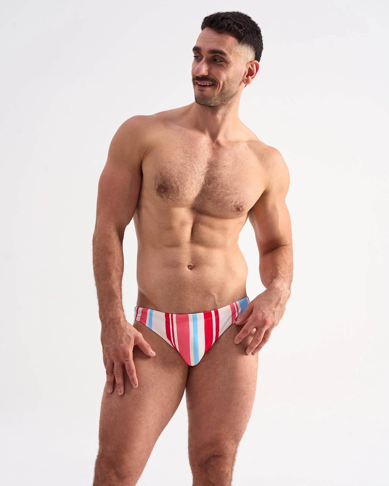 Vibrant striped cabana swim brief in red white and blue designed for comfortable swimming and beachwear