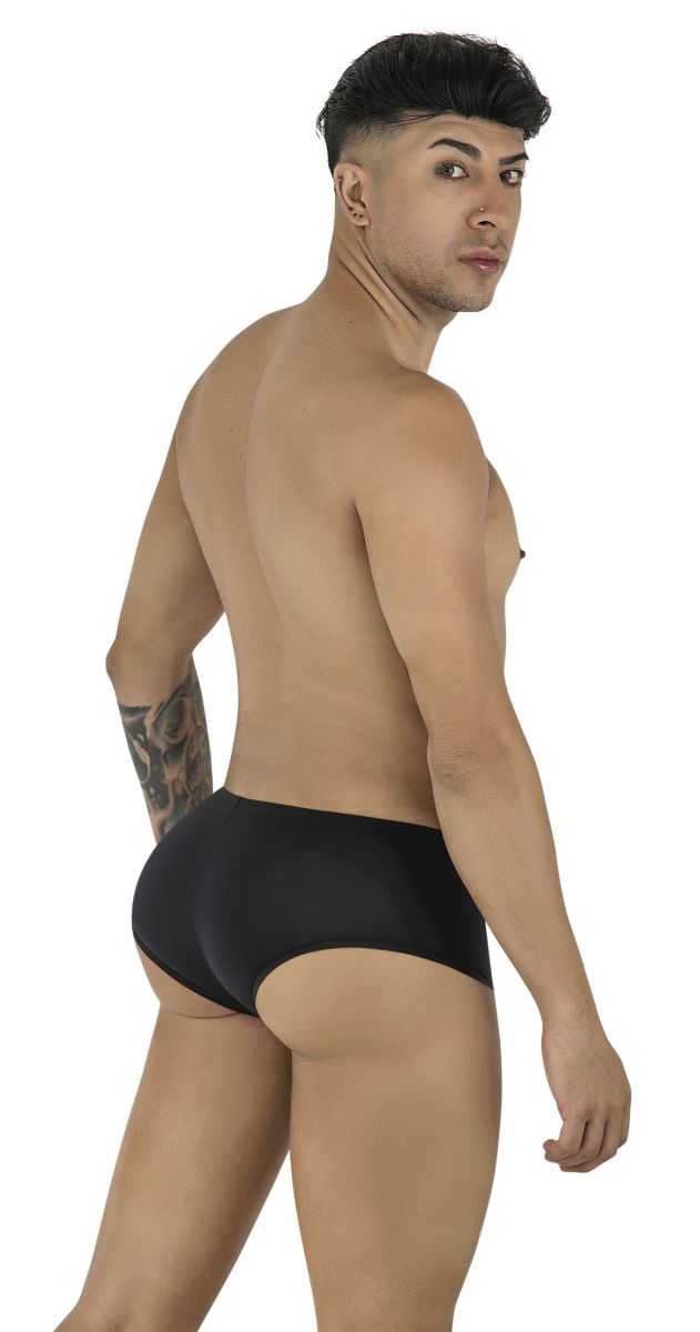 Model wearing black CandyMan 99943 trunks, seen from the back, posing over his shoulder against a white background.