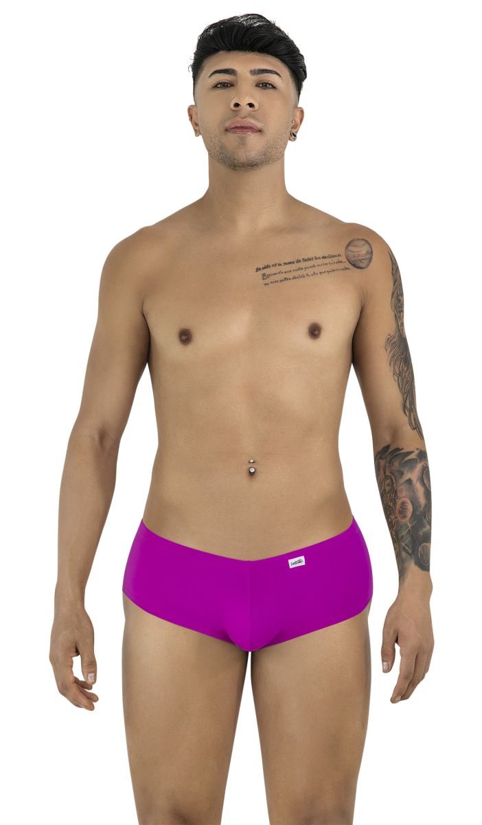 Man wearing magenta CandyMan trunks, standing centered against a plain white background.
