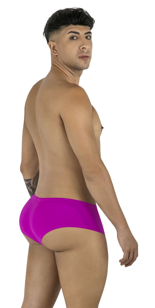 Man seen from behind wearing magenta CandyMan 99943 trunks, looking over his shoulder toward the camera.
