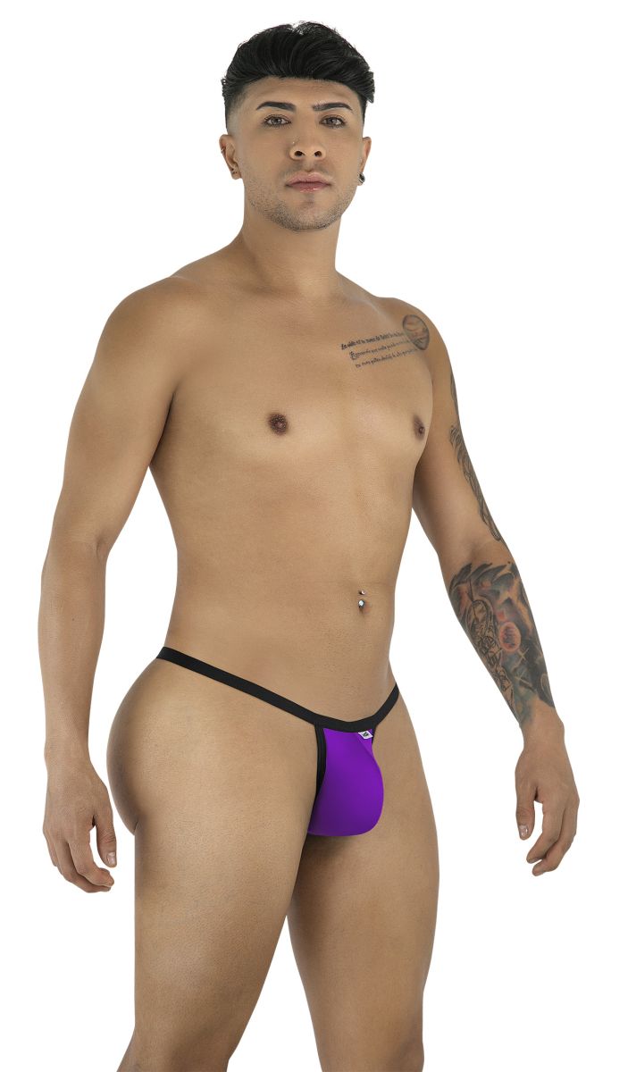A model posing in orchid CandyMan thongs with black trim against a white background.