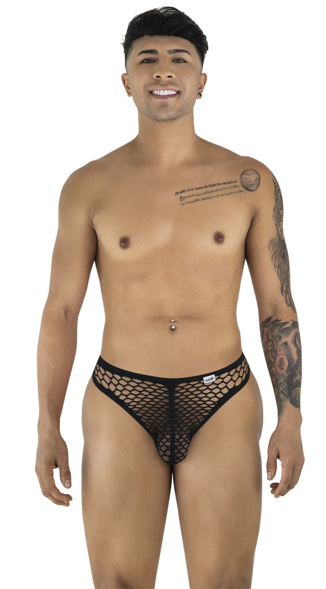Model posing in a black CandyMan fishnet thong with a small branded tag on the waistband.