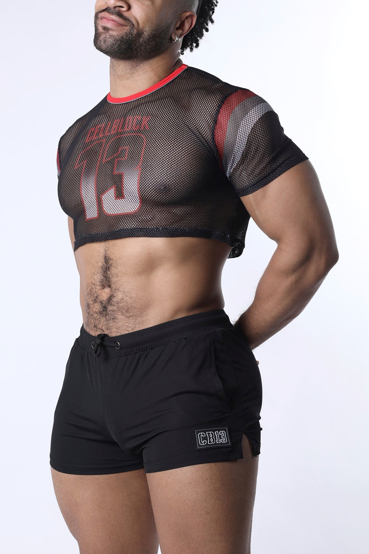 Chain reaction mesh crop top in black with red and gray accents featuring a bold 13 graphic on the front
