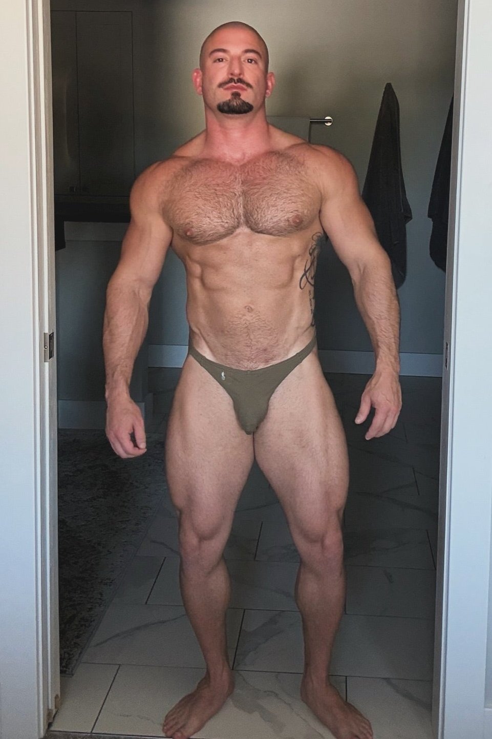 Olive green cheeky classic g-string thong briefs made from soft breathable fabric for athletic use shown from front