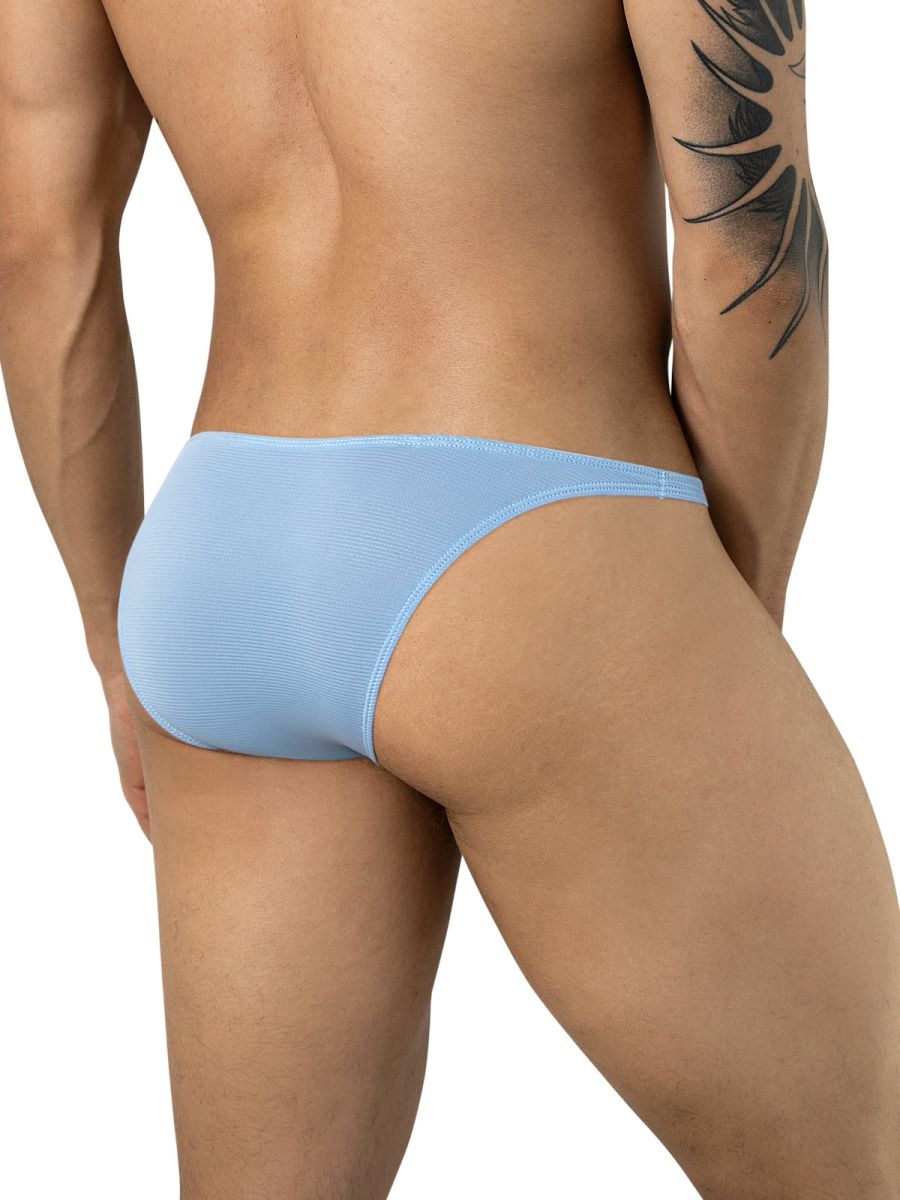 Rear view of light blue Cronos briefs worn, featuring thin side straps and textured fabric.