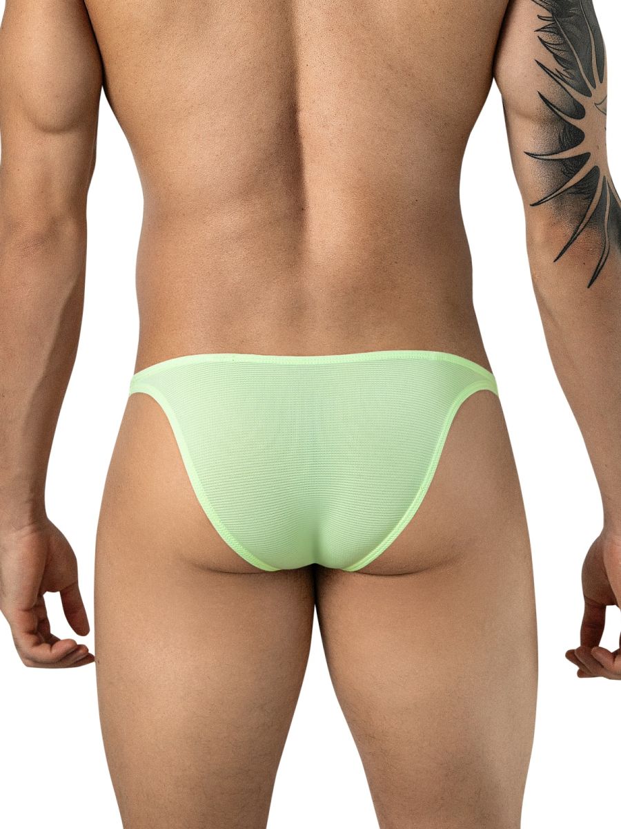 Rear view of a person wearing neon green briefs.